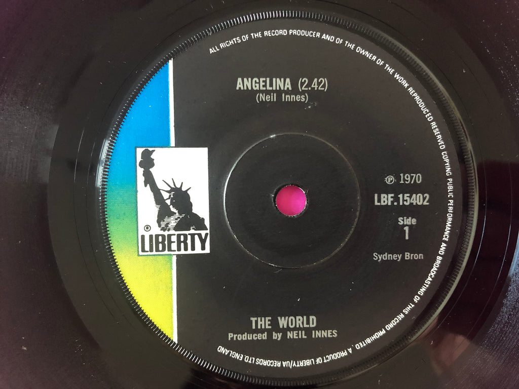 The World (4) : Angelina  (7", Single)